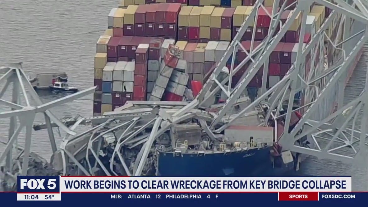 Work begins to clear Key Bridge collapse wreckage